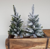 Kerstboom op houten voet kunst