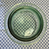 Oude groene glazen pot