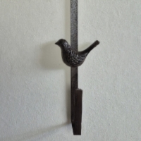 Deurkranshanger gietijzer vogel