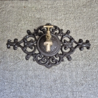 Gietijzeren ornament muurkraan