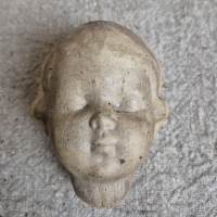 Oude mal voor poppen hoofd