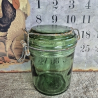 Oude groene glazen weckpot