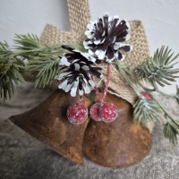 Touw met kerstbelletjes roest